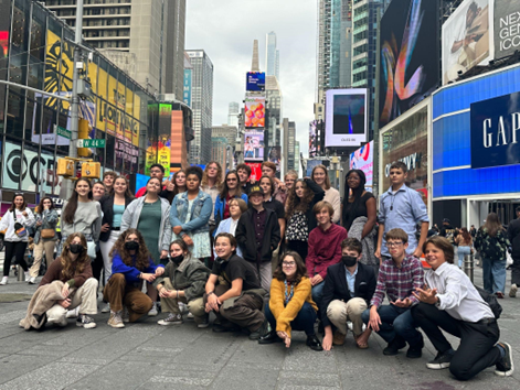 students standing in time square